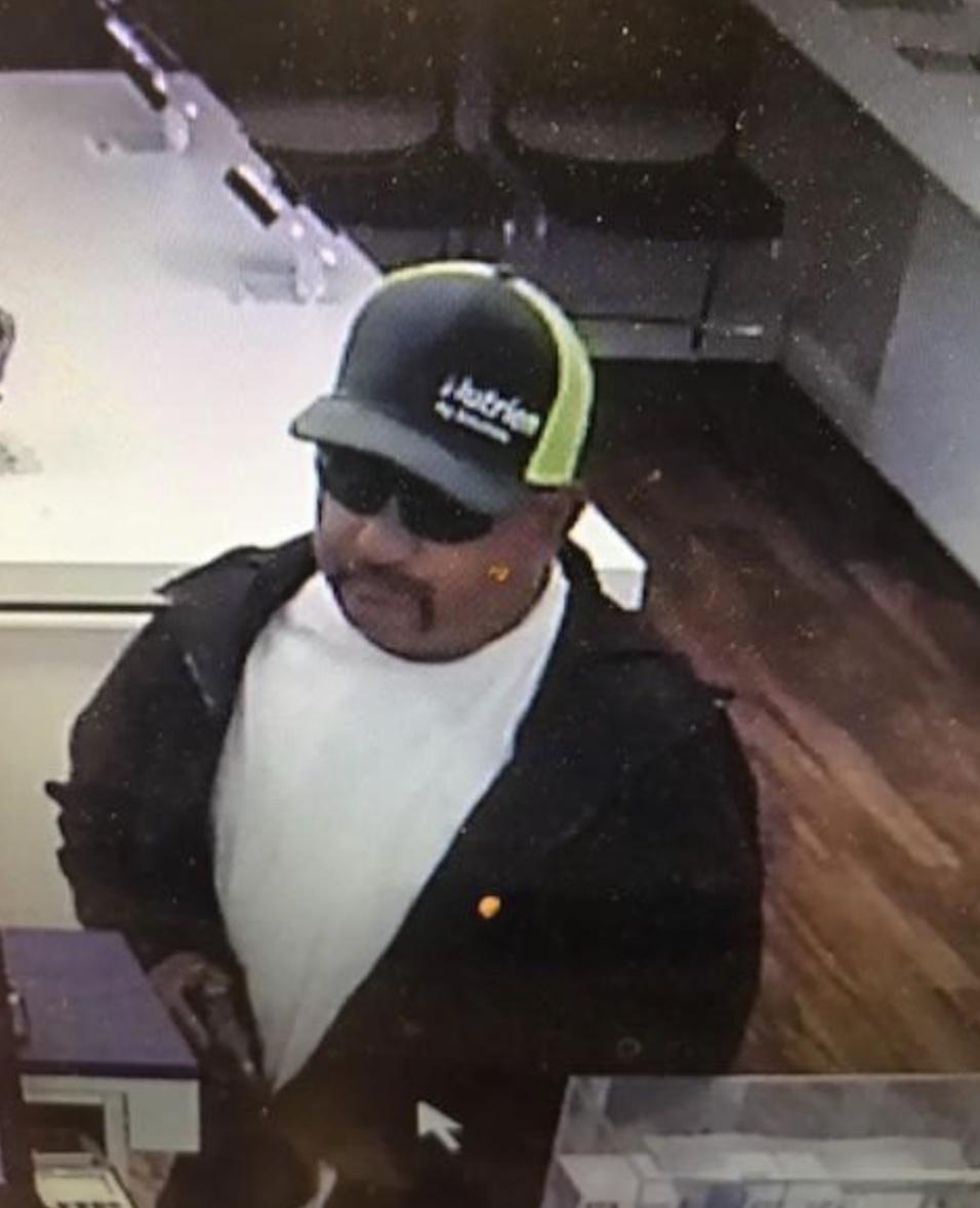 Metro PCS Robbery suspect captured on security camera. Photo courtesy of the San Luis Obispo Police Department