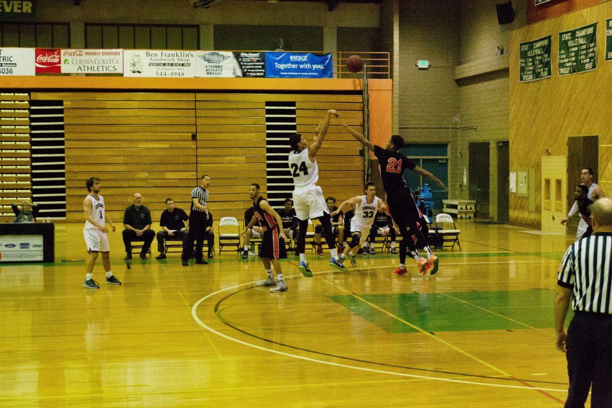 Keshawn Liggins (Fr) shooting over a Ventura defender.