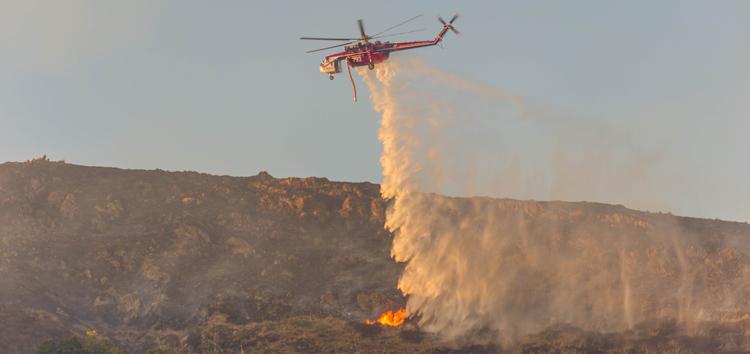 Fast moving brush fire forces evacuations at Cal Poly