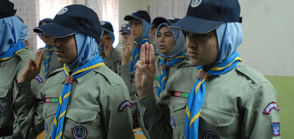 A group of Afghan Girl Scouts recite the scout motto during their meeting. These girls are part of the Marastoon Boy and Girl Scout Troop in Kabul. The troop currently has more than 200 scouts and hopes to have 400 in 2011.