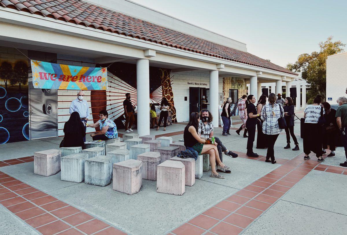 Opening night for the â€œWe Are Hereâ€ event at Cuesta College. Photo by Adam J. Schooley