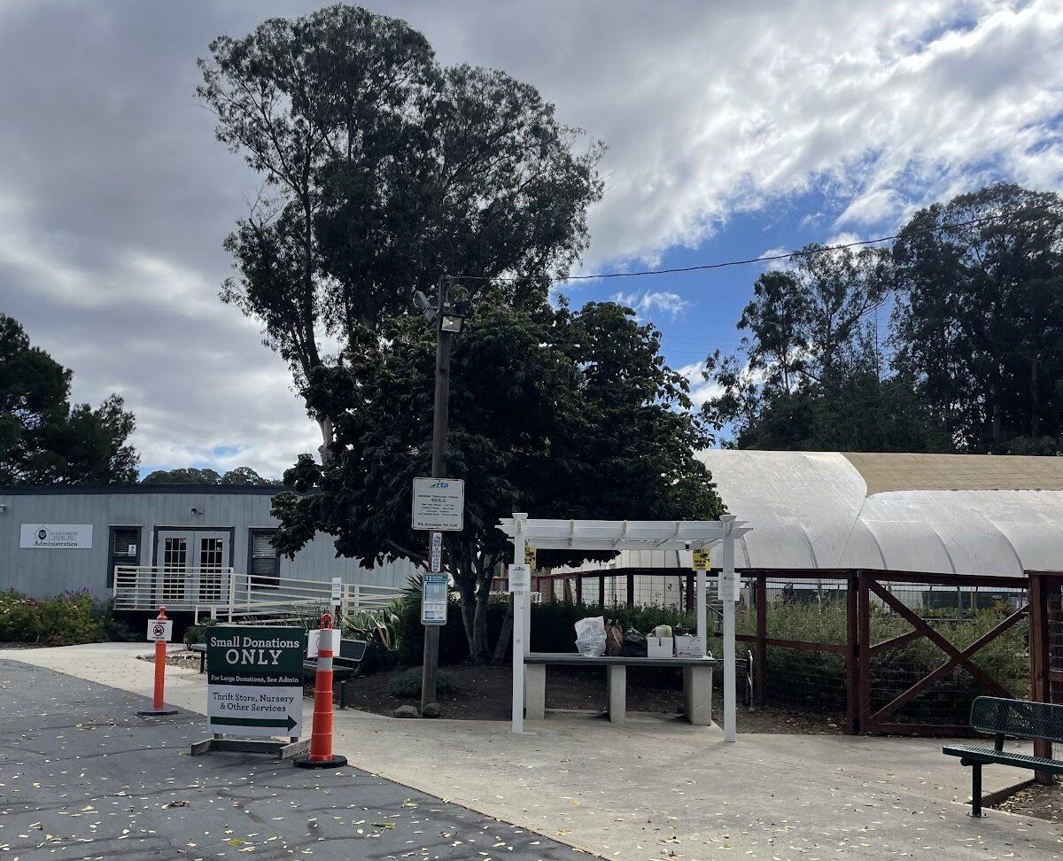 A doonation stand set up in front of Achievement House. Photo by Alena Stanley