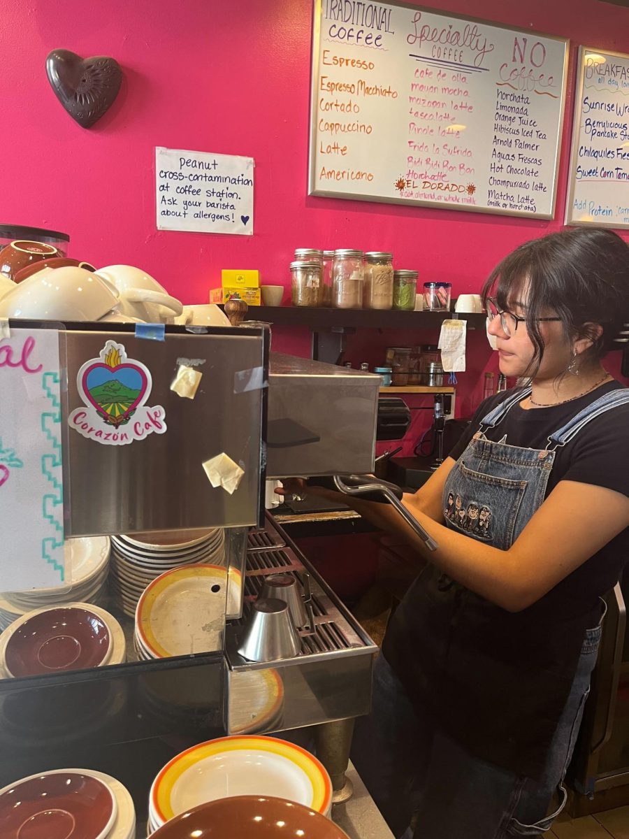 Barista Dani Pozos makes coffee at Corazón Cafe located on Higuera St in SLO. Corazon Cafe is a Southern Mexican cafe and coffee shop serving Latin inspired food and drinks.