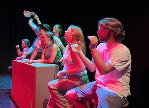 Actors cheering during a full run-through rehearsal of a “A Midsemester Night’s Mashup” on Sept. 27.. Photo by Lindsey McKee