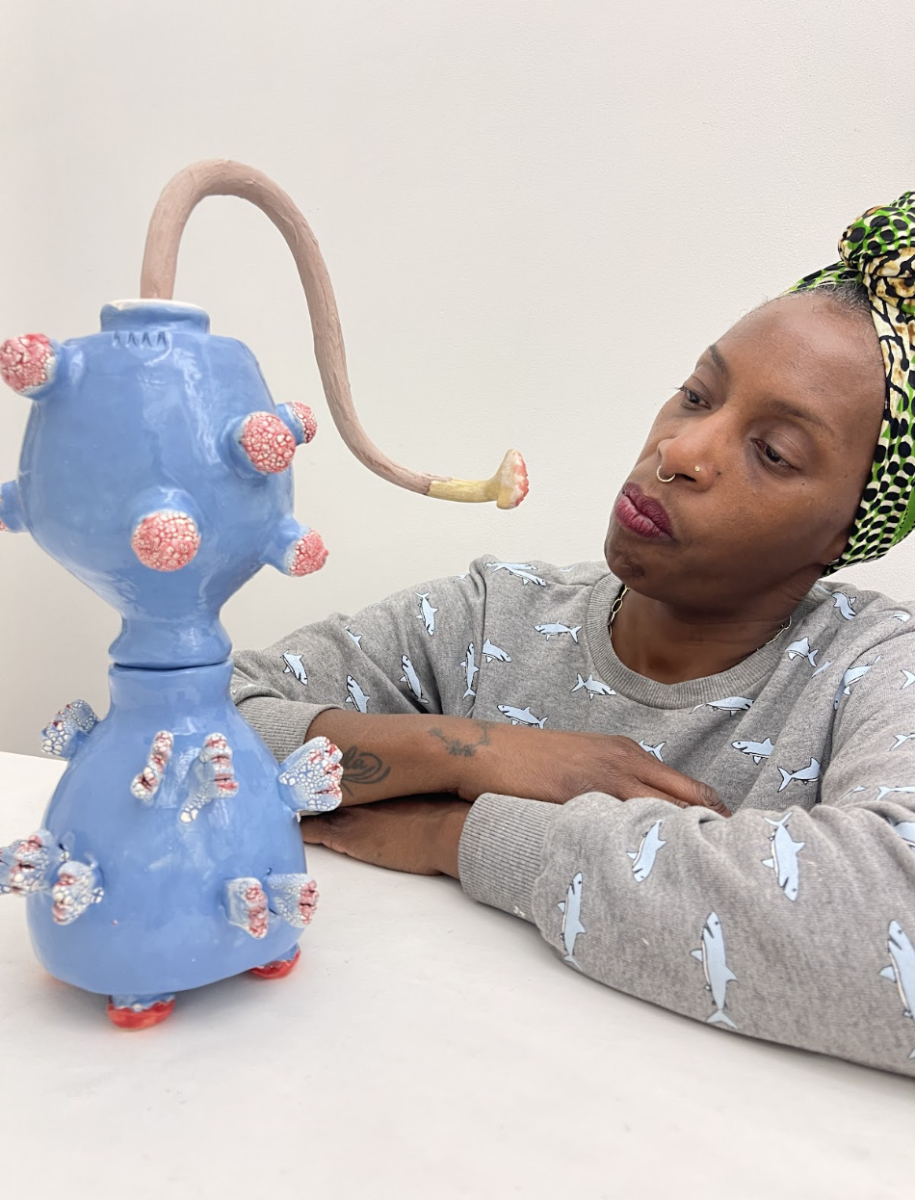 Co-curator of "Not Enough Future" and artist Connie Martin Treviño, with one of her ceramic works. Image courtesy of Connie Martin Treviño.