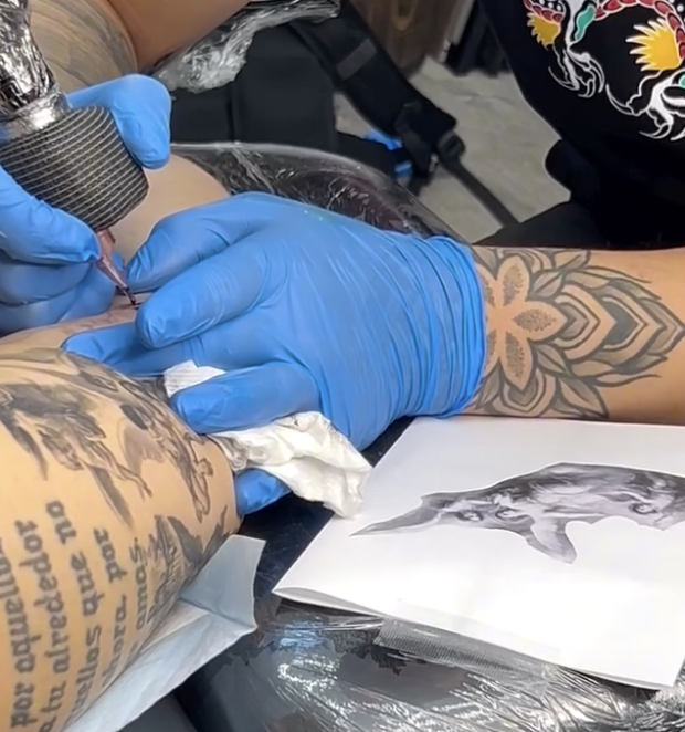 An artist works on a client's latest addition at Birdhouse Tattoo Collective in San Luis Obispo. 