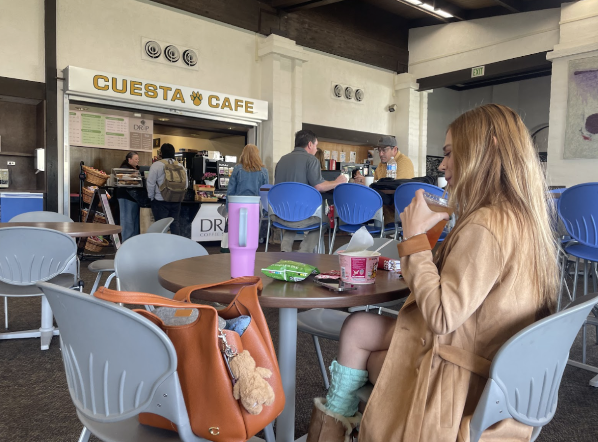 Third-year elementary education student Riana Martinez enjoys her "Lucky Leprechaun" on Jan. 20 – one of this months specials at Drip Coffee. "I really appreciate what a big variety they offer in drinks and snacks. The vending machines weren't doing it for me," she said.