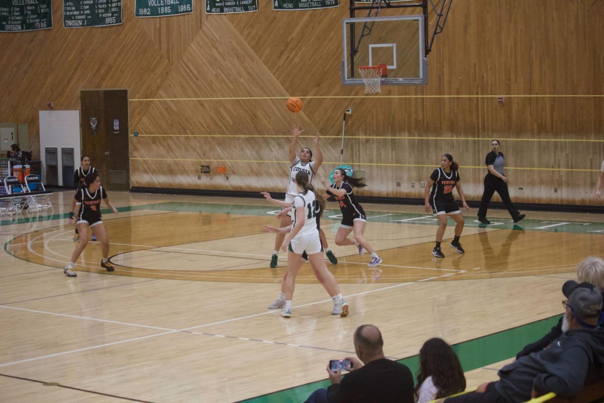 The Cougars’ Kinzie Amer (#3) scores after receiving a pass to tie the game halfway through the fourth quarter against Ventura on Feb. 15 at Stork Gymnasium. 
