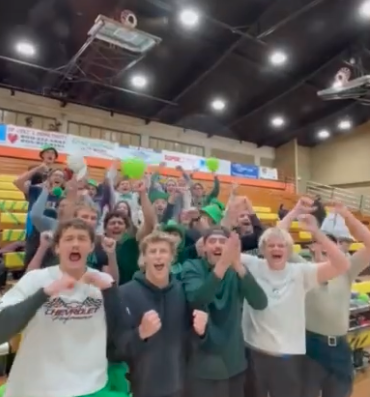 The "Cuesta Crazies" cheer at the Cuesta College men's basketball game against LA Pierce College on Feb. 18.