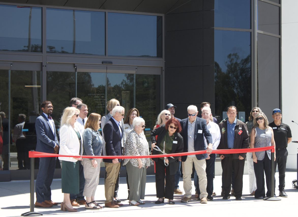 Cuesta College Board of Trustees President Debra Stakes cutting the ribbon during the opening celebration for the San Luis Obispo Campus Center on Wednesday, June 3. "Every project on Measure L takes enormous amount of effort to bring to life," said Stakes. Stakes played a big role in helping get Measure L passed in 2014, by using her position at the time of Faculty Union President to educate people about the importance of passing the bill and working to build back trust in Cuesta's administration.